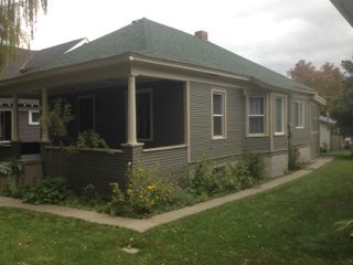 Kitchen cabinet and wall painting completed by New Age Painting for a Helena homeowner